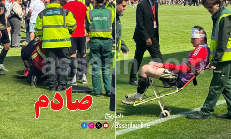 Un supporter frappe un joueur à la tête