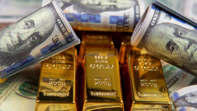 Les prix de l'or chutent alors que le dollar monte