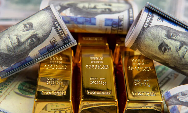 Les prix de l'or chutent alors que le dollar monte