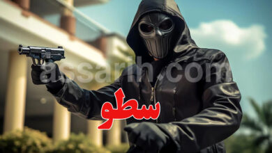 homme masqué arme a feu